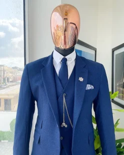A navy blue Jorgecarli Super 140’s “Board Room” notch lapel suit