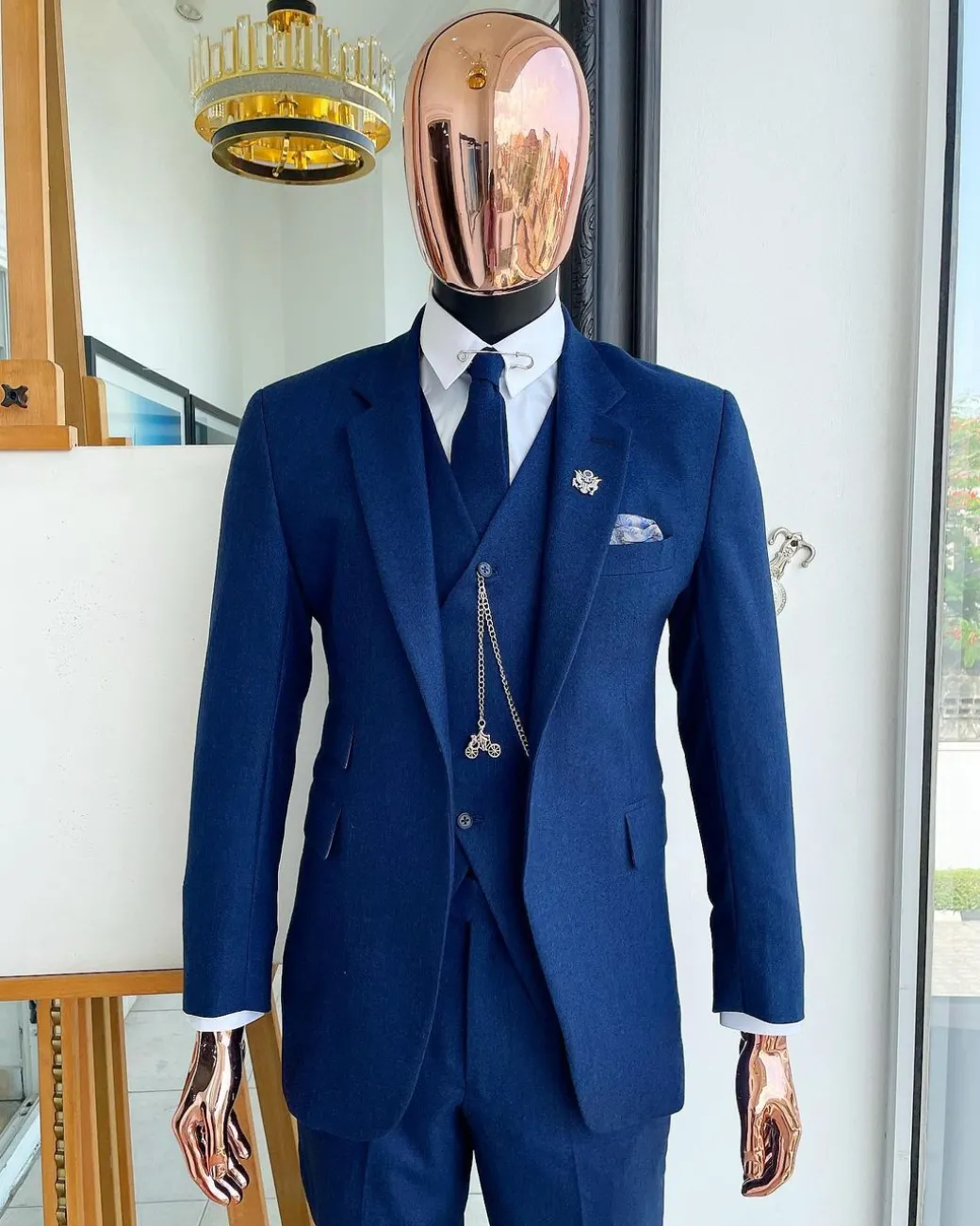 A navy blue Jorgecarli Super 140’s “Board Room” notch lapel suit