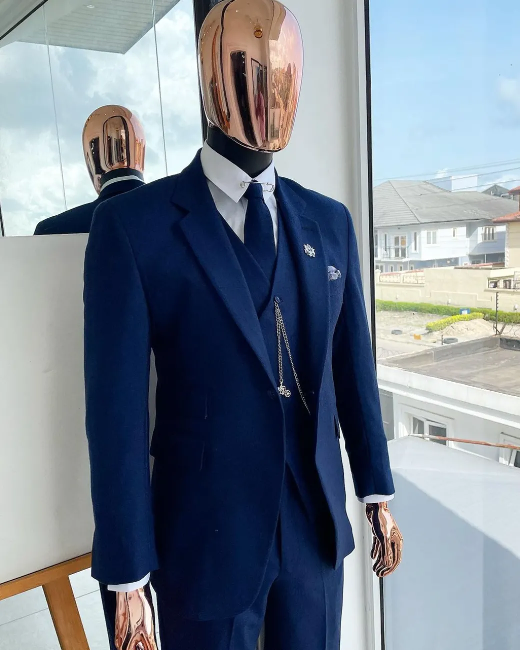 A navy blue Jorgecarli Super 140’s “Board Room” notch lapel suit