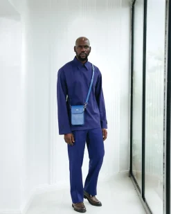 A Navy blue, layered front-covered shirt.
