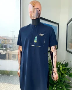 A Navy blue, multileg intersection pocket with clear view flap Swarovski button detailing african traditional senator kaftan native.