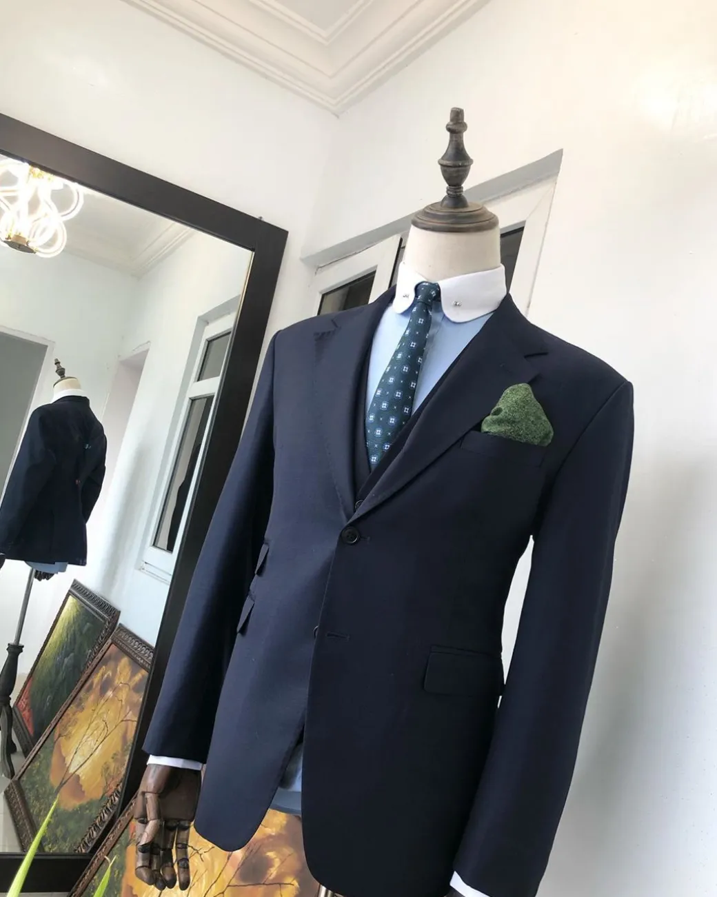 A Navy Blue notch lapel Suit