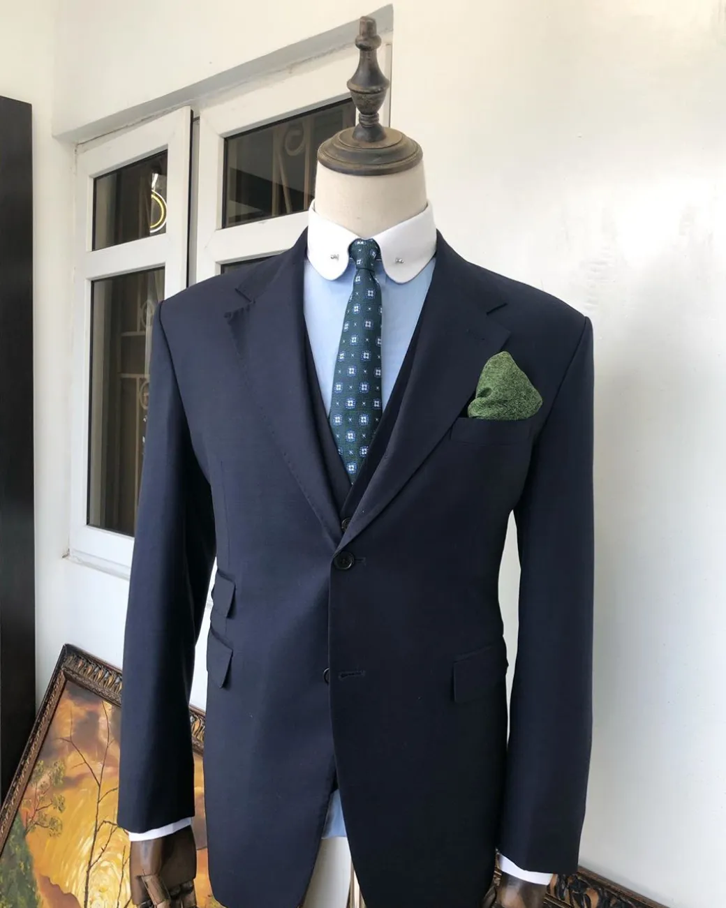 A Navy Blue notch lapel Suit