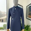 A Navy blue “parabellum”, wrap notch lapel blazer suit