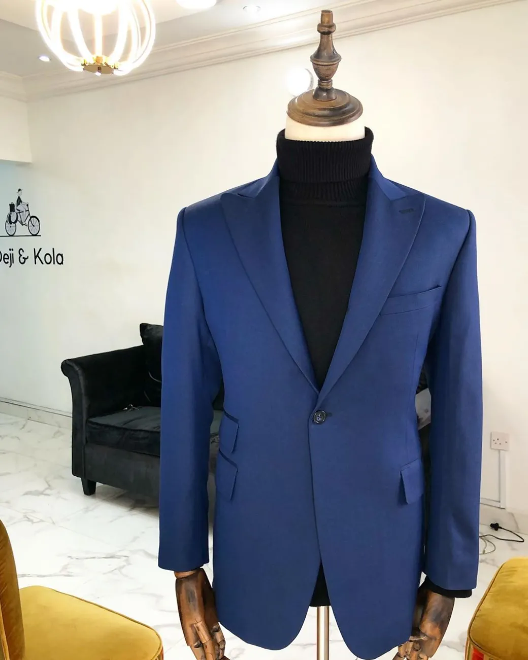 A Navy Blue Peak Lapel Business Suit
