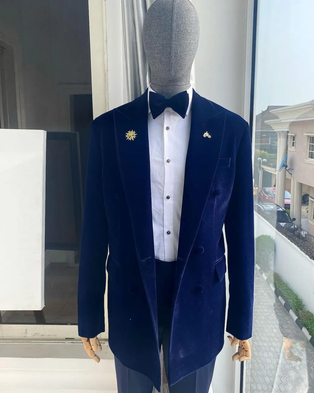 A Navy Blue Peak Lapel Double Breasted Soaked Italian Velvet Tuxedo Suit