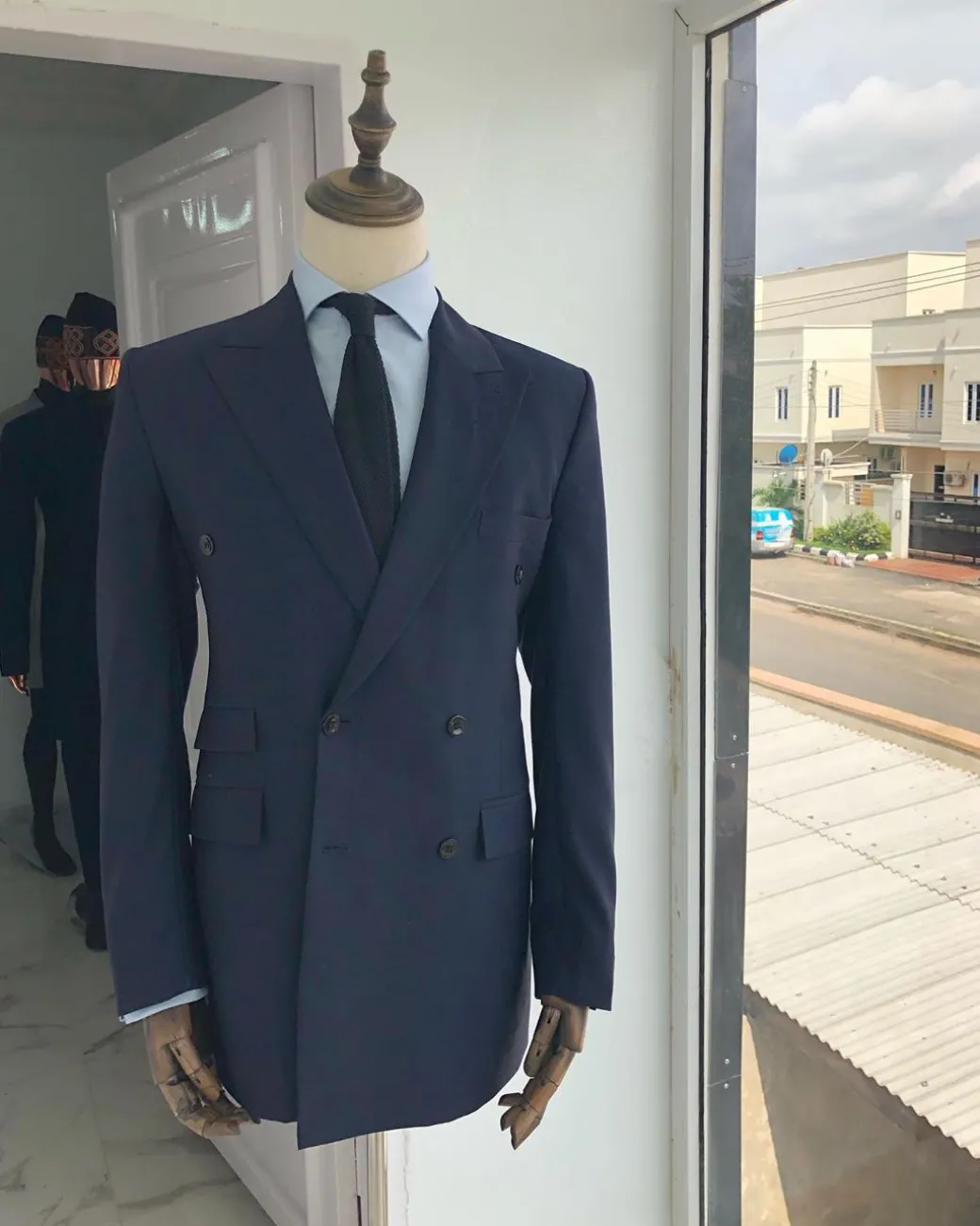 A Navy Blue Peak lapel double-breasted Suit With Gold Detailing