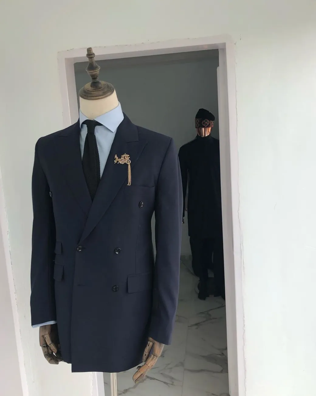 A Navy Blue Peak lapel double-breasted Suit With Gold Detailing