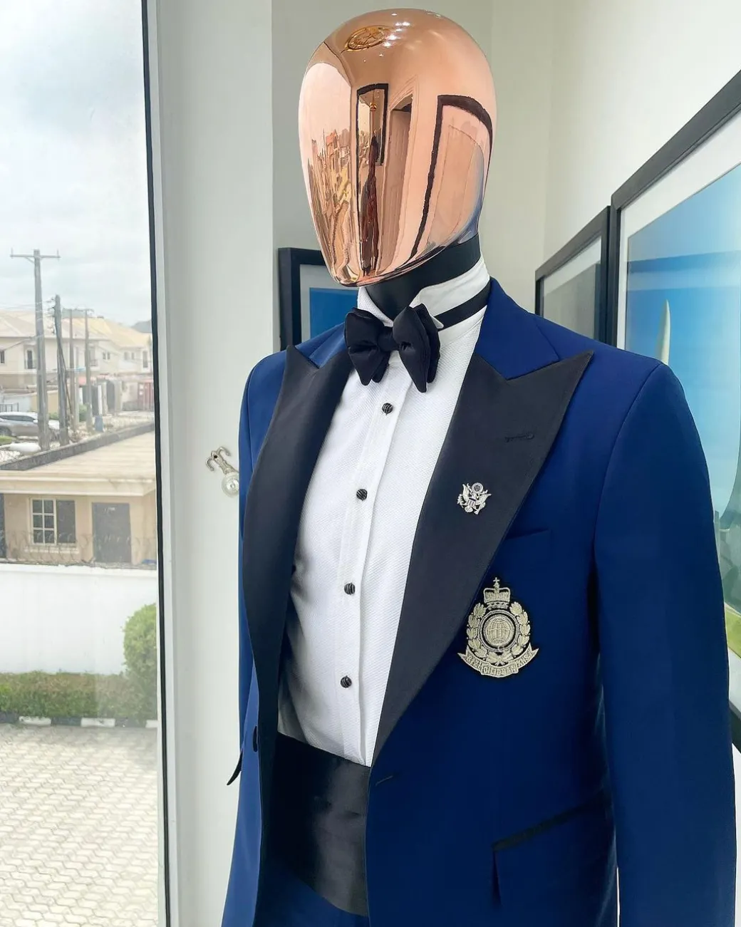 A Navy blue peak lapel tuxedo suit