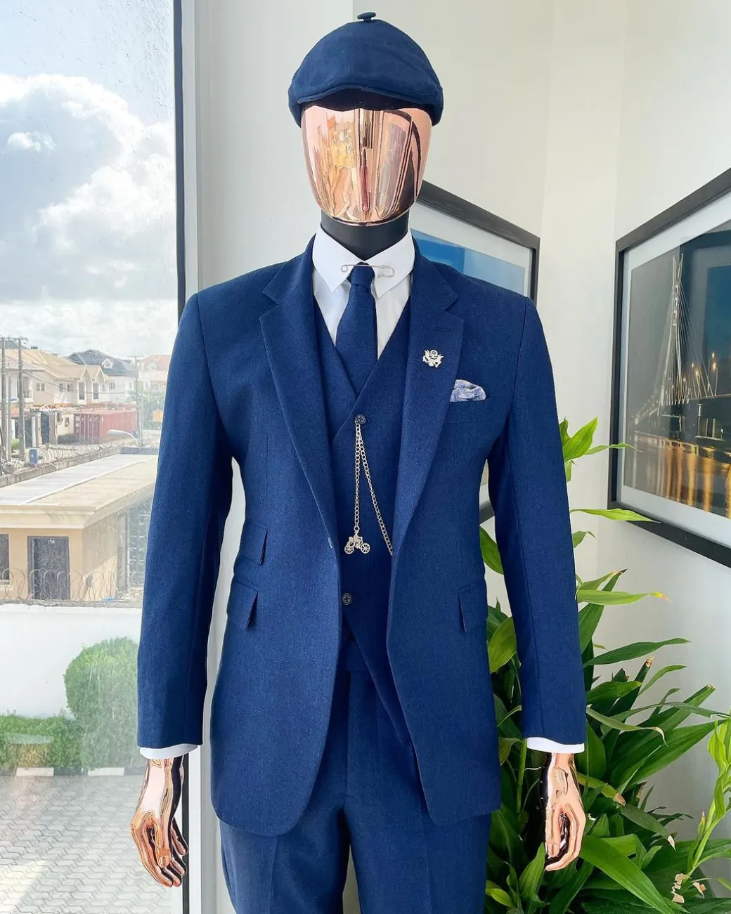 A navy blue “peaky blinders” – Jorgecarli super 140’s- “Board Room” notch lapel suit