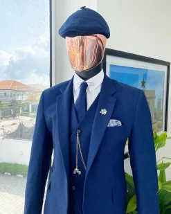 A navy blue “peaky blinders” – Jorgecarli super 140’s- “Board Room” notch lapel suit