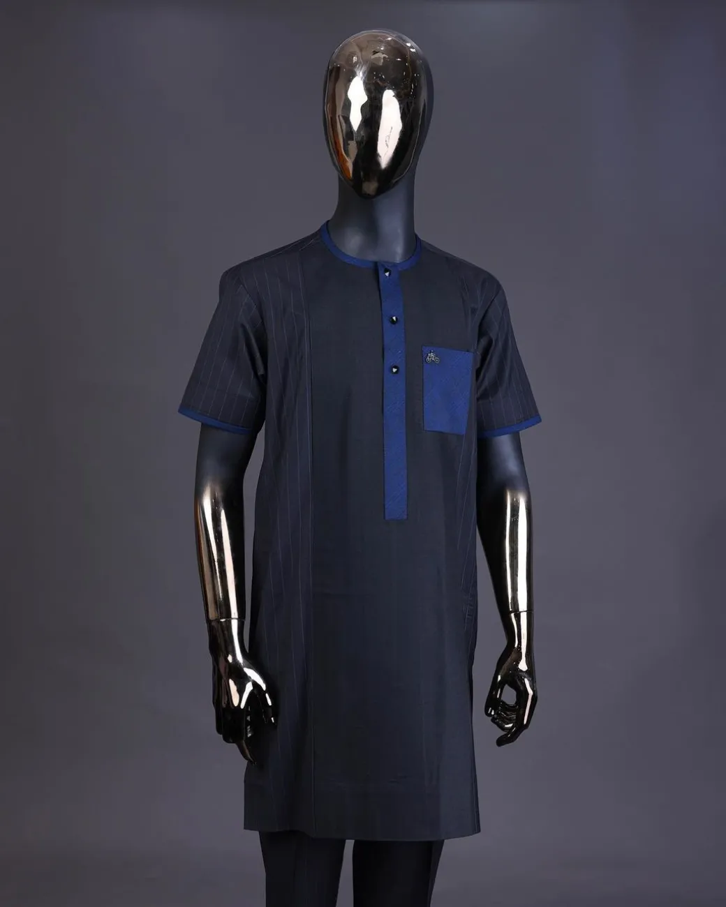 A Navy blue pencil stripe on black, black front with matching blue-black Swarovski button detailing kaftan and Sokoto