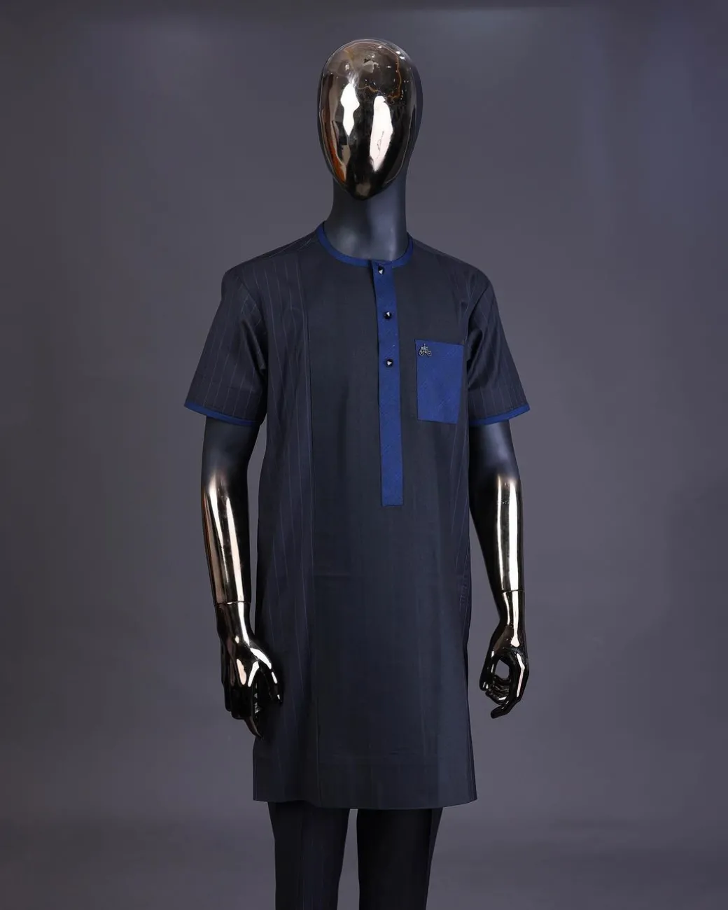 A Navy blue pencil stripe on black, black front with matching blue-black Swarovski button detailing kaftan and Sokoto