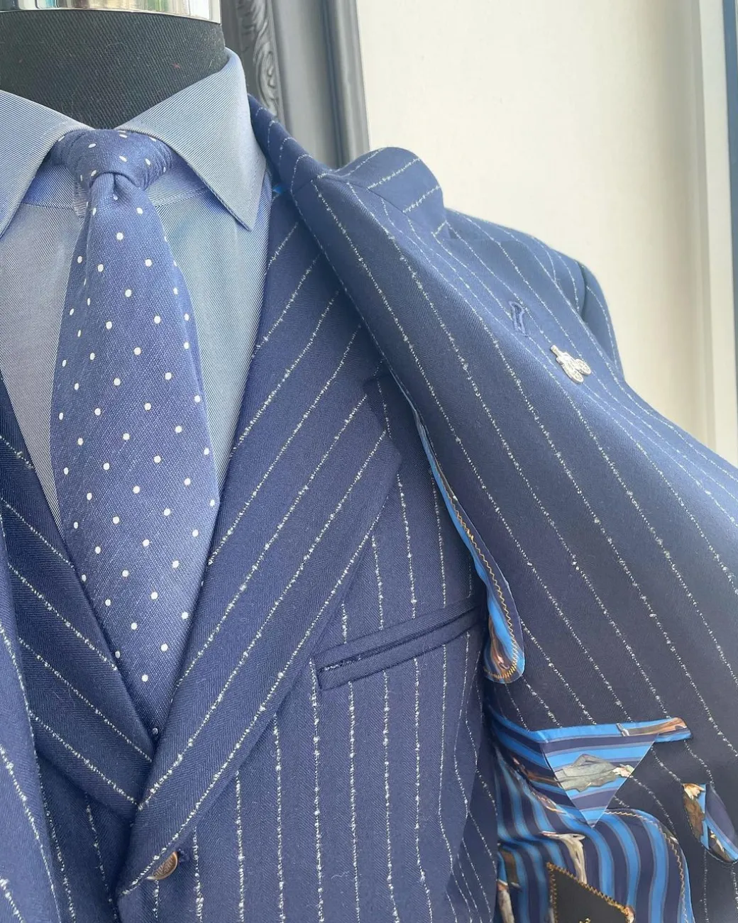A Navy blue pencil stripe – Jorgecarli super 110’s- “Board Room” notch lapel patch pocket suit