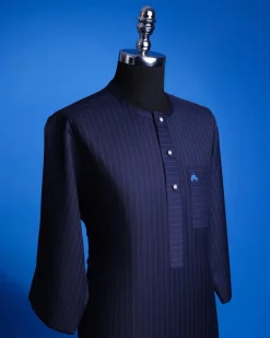 A Navy Blue, Pin Stripe, front flap & Pocket interchanged, 3/4 sleeve African senator kaftan native.