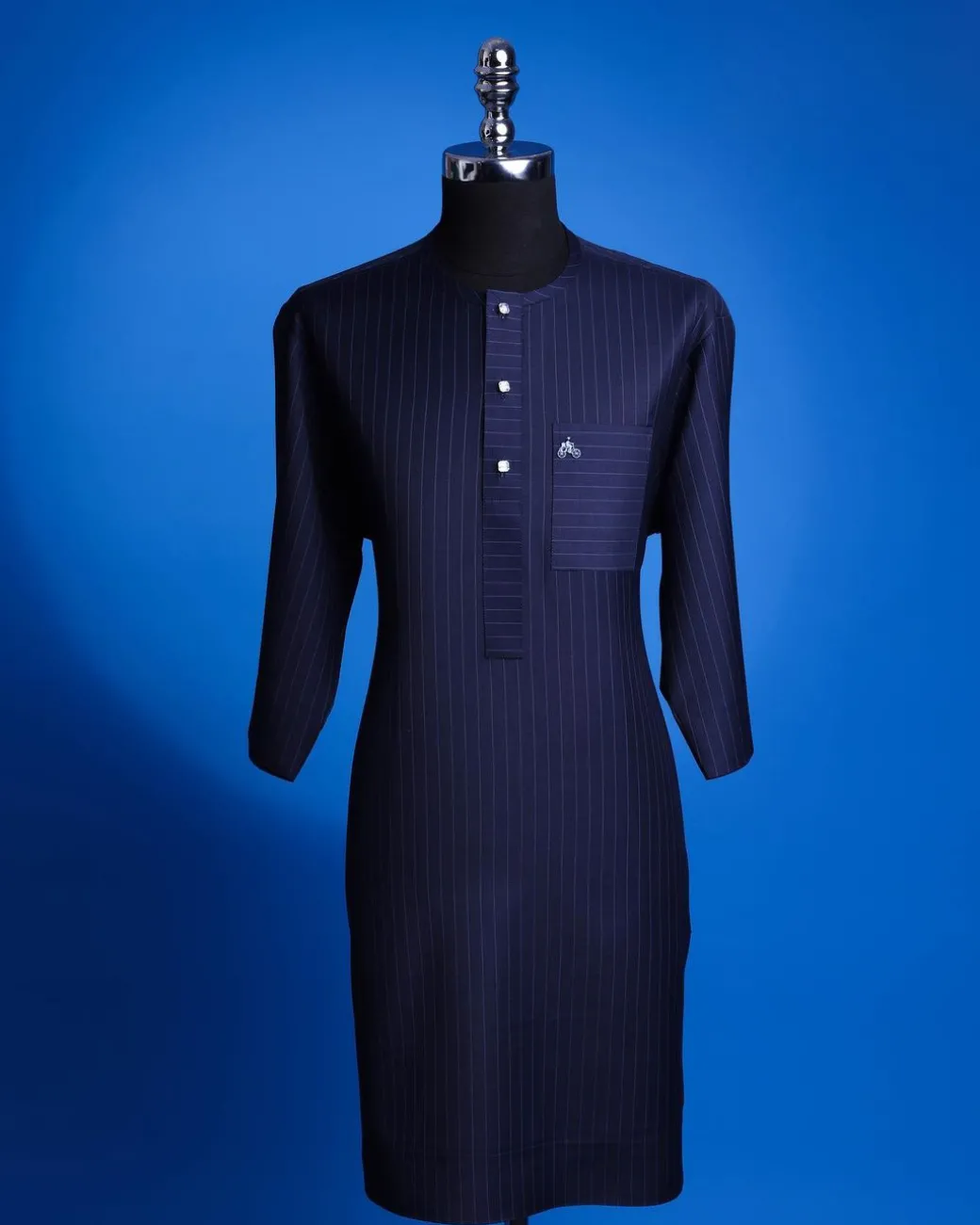 A Navy Blue, Pin Stripe, front flap & Pocket interchanged, 3/4 sleeve African senator kaftan native.