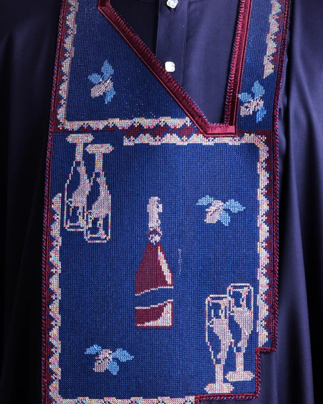 A Navy blue, “pop pop pop”embroidery details agbada, mint blue clear view Swarovski buttons on 3/4 sleeve kaftan & sokoto