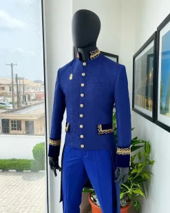 A Navy blue “Prince of Persia” ceremonial tail suit, Gold Metal Wire hand woven embroidery detail mix on velvet