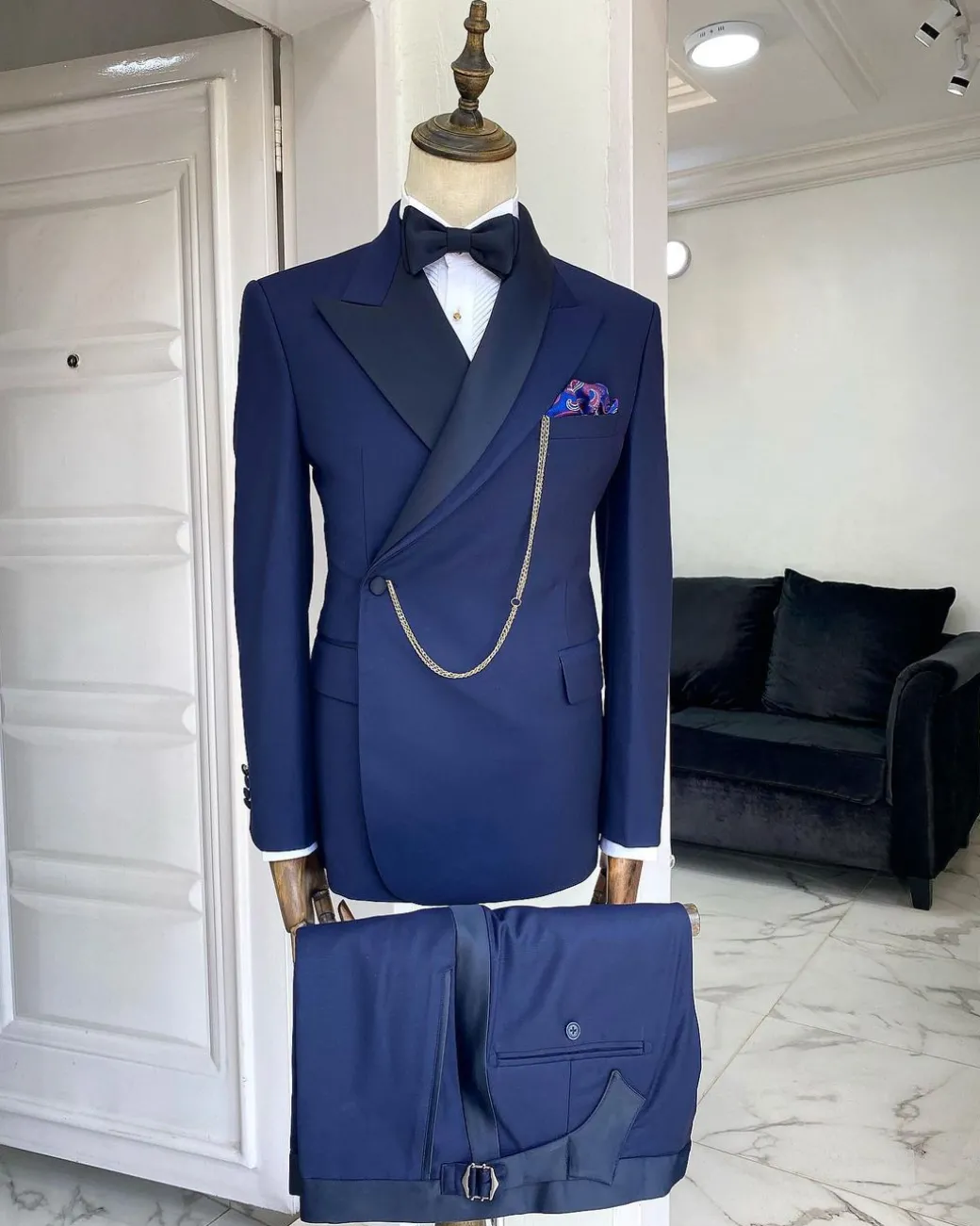 A Navy blue Reloaded “Arthur Richard” wrap peak and shawl lapel Tuxedo Suit