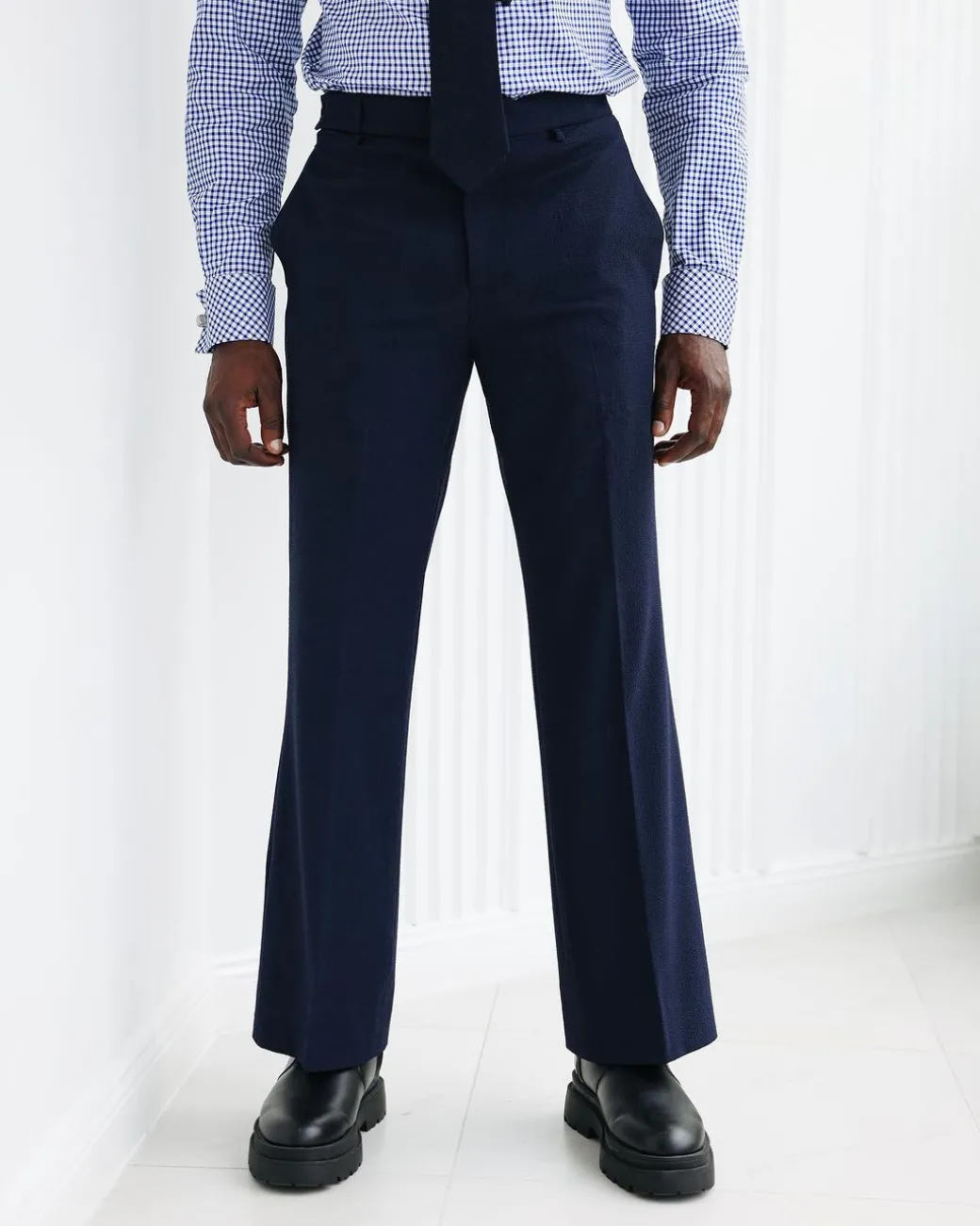 A Navy Blue, Seer Sucker, Wide Cut Pant With Side Metal Adjuster