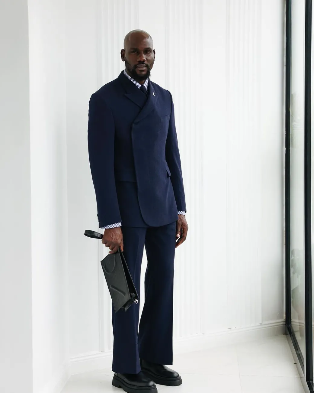 A Navy Blue, Seersucker, “Herd” Warp Peak Lapel Suit.