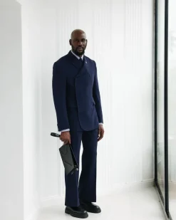 A Navy Blue, Seersucker, “Herd” Warp Peak Lapel Suit.