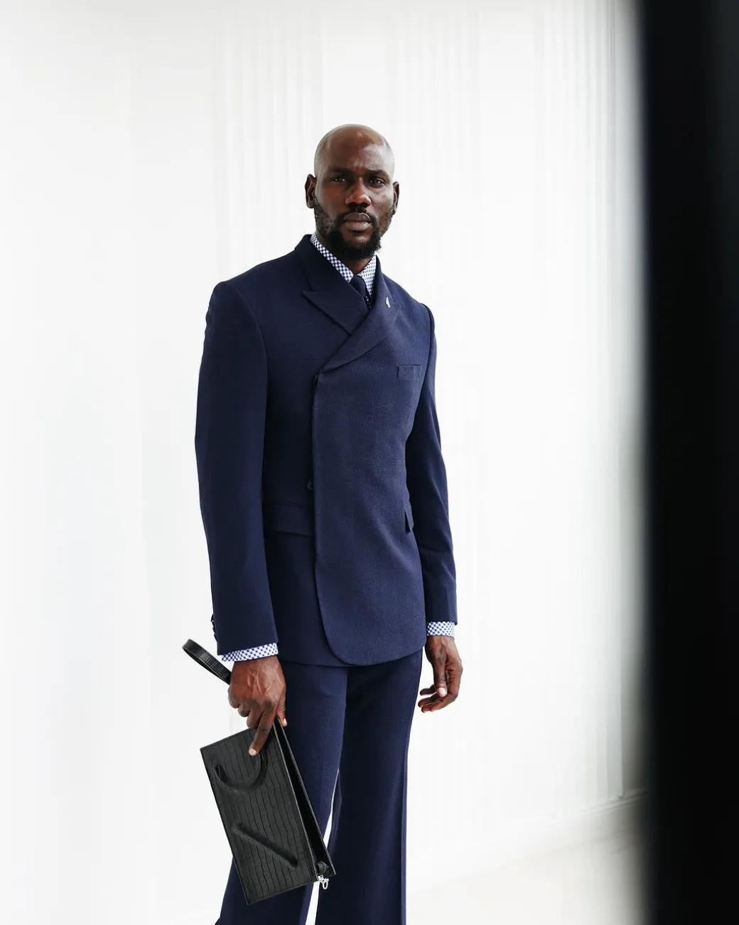 A Navy Blue, Seersucker, “Herd” Warp Peak Lapel Suit.