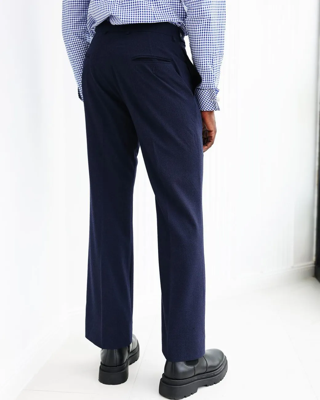 A Navy Blue, Seersucker, “Herd” Warp Peak Lapel Suit.