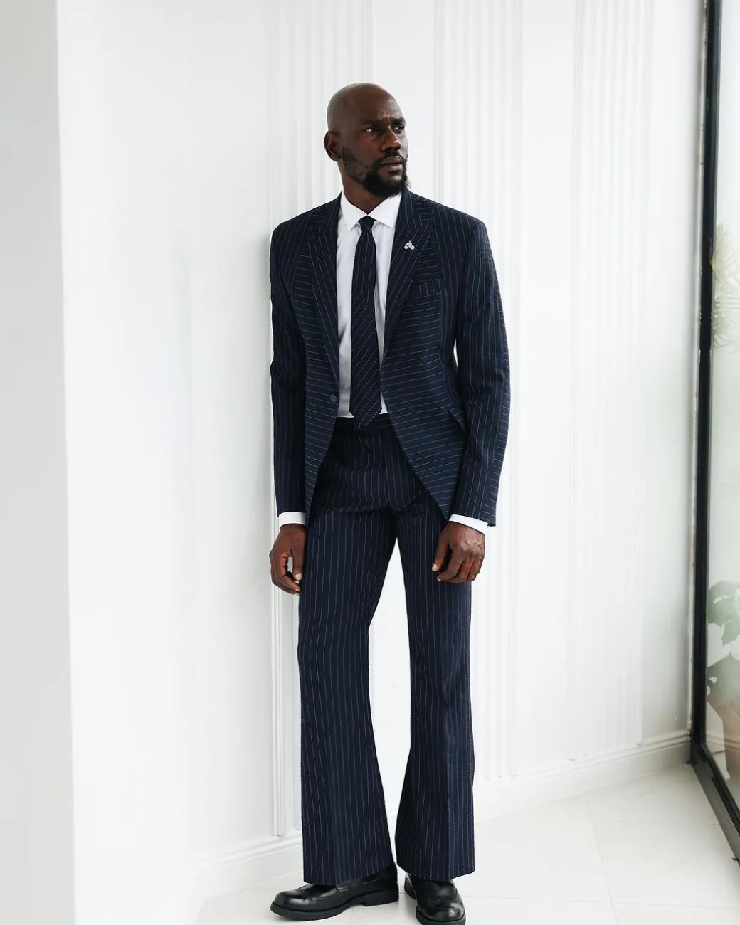 A Navy Blue, Seersucker, Reversed Pin Stripe Peak Lapel Suit
