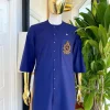 A navy blue “shirtan”, clear view jet black Swarovski button detailing, and hand-woven metal wire embroidery patch African traditional senator kaftan native