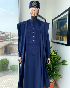 A Navy Blue, Slanting Cube With Dotted Gold Detailing Agbada