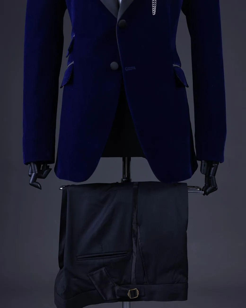 A Navy blue, soaked velvet peak lapel tuxedo suit