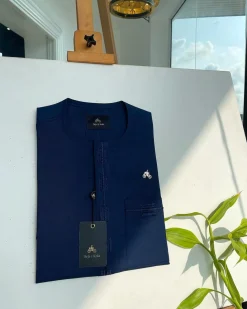 A Navy blue, straight and box connecting lane embroidery detailing african traditional senator kaftan native.