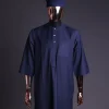 A Navy Blue, v and square shaped pocket with net embroidery details, 3/4 sleeve African senator Kaftan native.