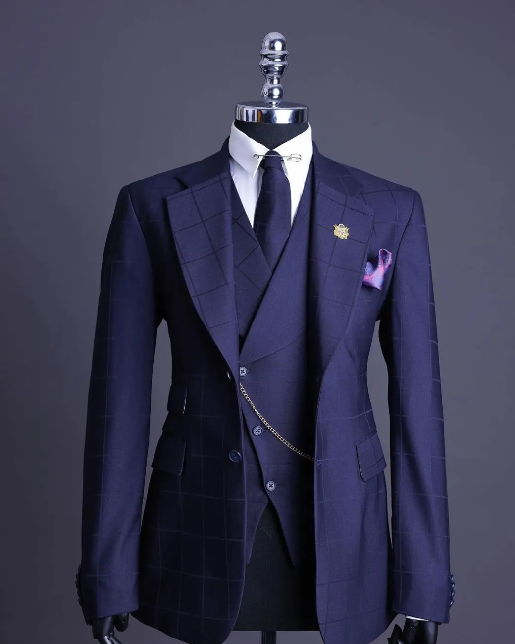 A Navy blue, windowpane check, monochrome nobility super “140s” “Board Room” Notch lapel suit