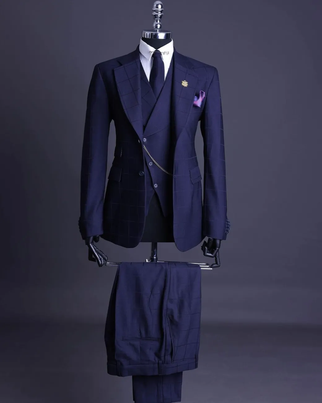 A Navy blue, windowpane check, monochrome nobility super “140s” “Board Room” Notch lapel suit