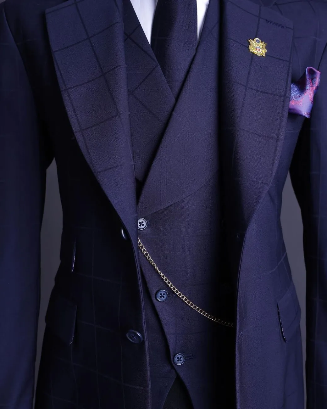 A Navy blue, windowpane check, monochrome nobility super “140s” “Board Room” Notch lapel suit