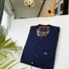 A Navy Blue With mixed Swarovski buttons detailing African Kaftan and sokoto
