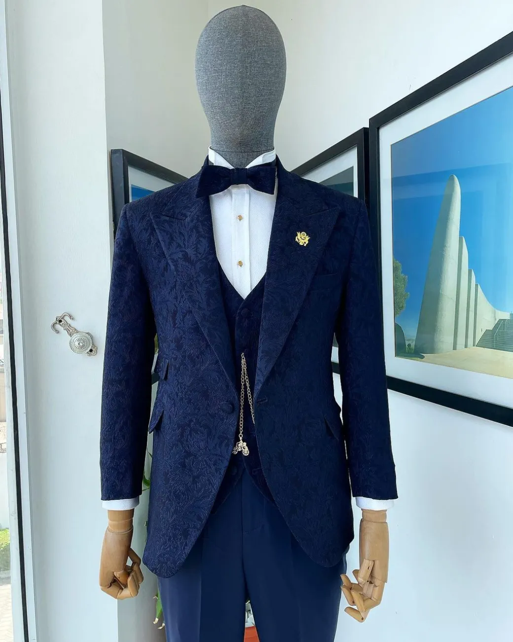 A peak lapel, ruffled floral pattern jacquard tuxedo suit