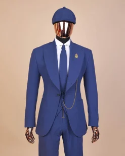A “peaky blinders” navy blue seersucker fabric knitted peak lapel suit