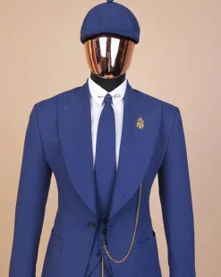 A “peaky blinders” navy blue seersucker fabric knitted peak lapel suit