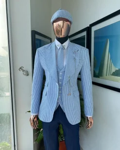A “peaky blinders” skye blue and white check, seer sucker fabric, knitted, peak lapel suit