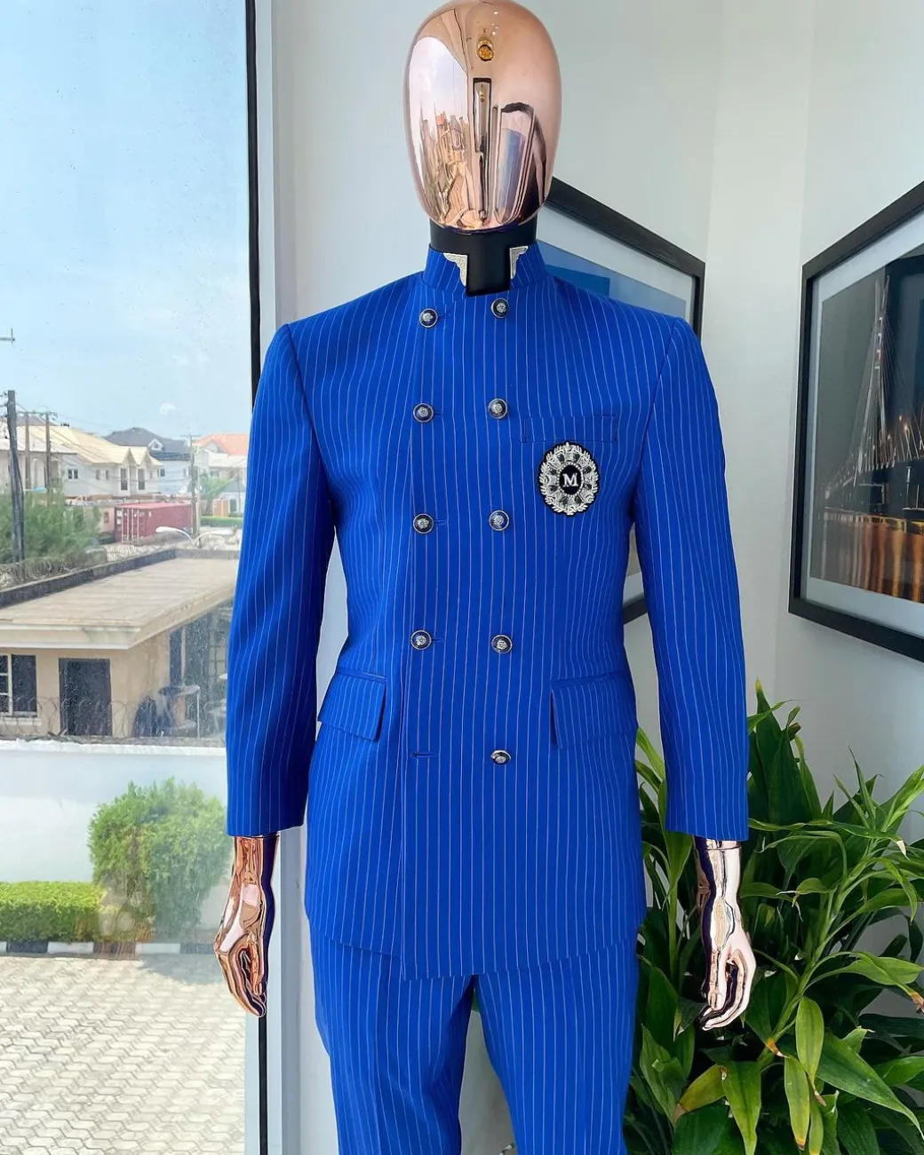 A pencil stripe cobalt & sky blue “preacher” double breasted safari suit