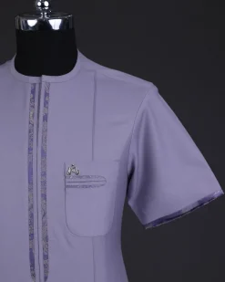 A periwinkle purple, zip line, paisley details, short sleeve African senator kaftan native.