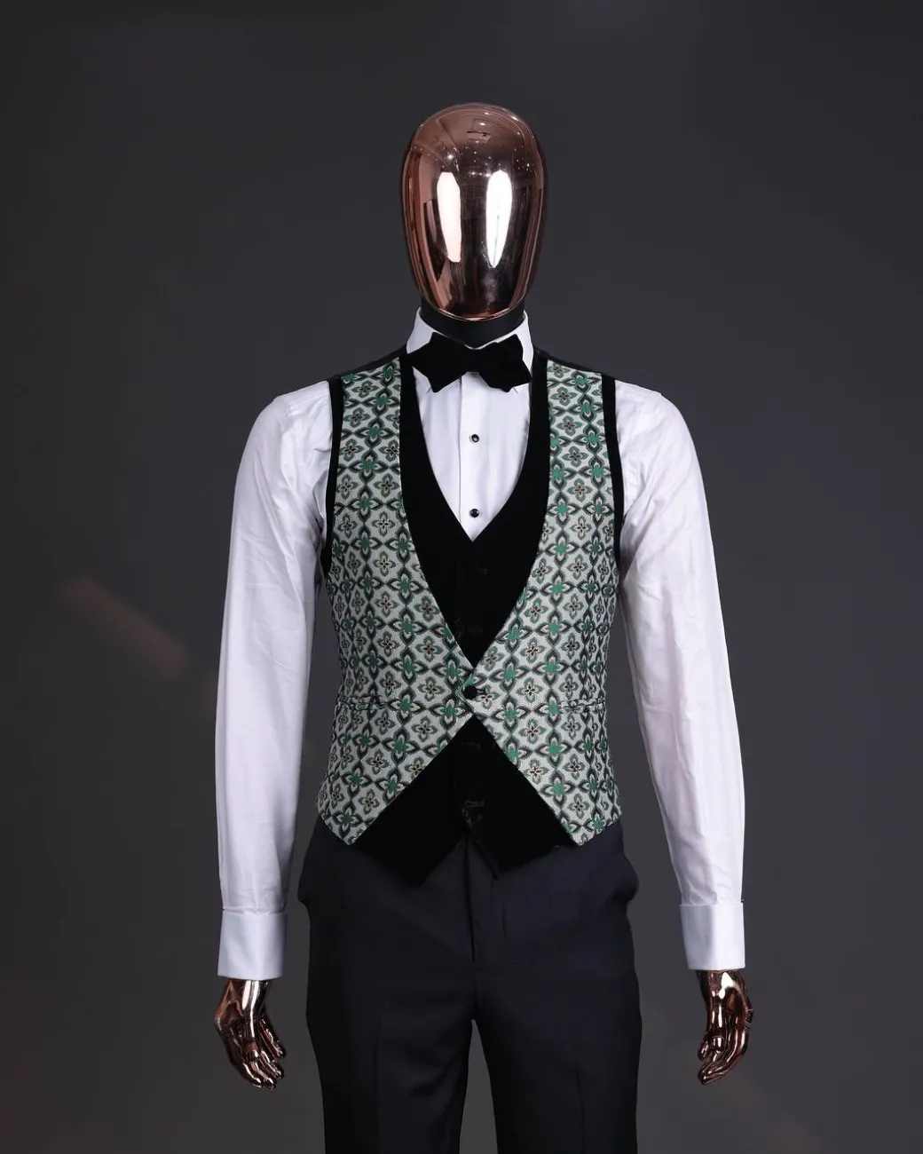 A Pine, pistachio green and black mix metallic jacquard, peak lapel tuxedo suit