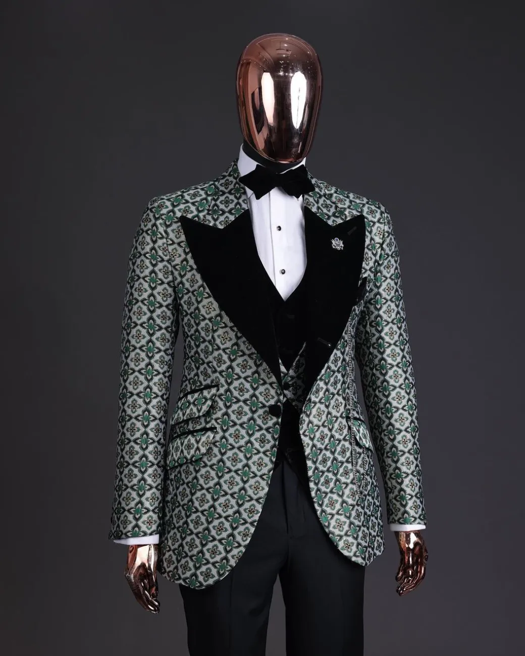 A Pine, pistachio green and black mix metallic jacquard, peak lapel tuxedo suit