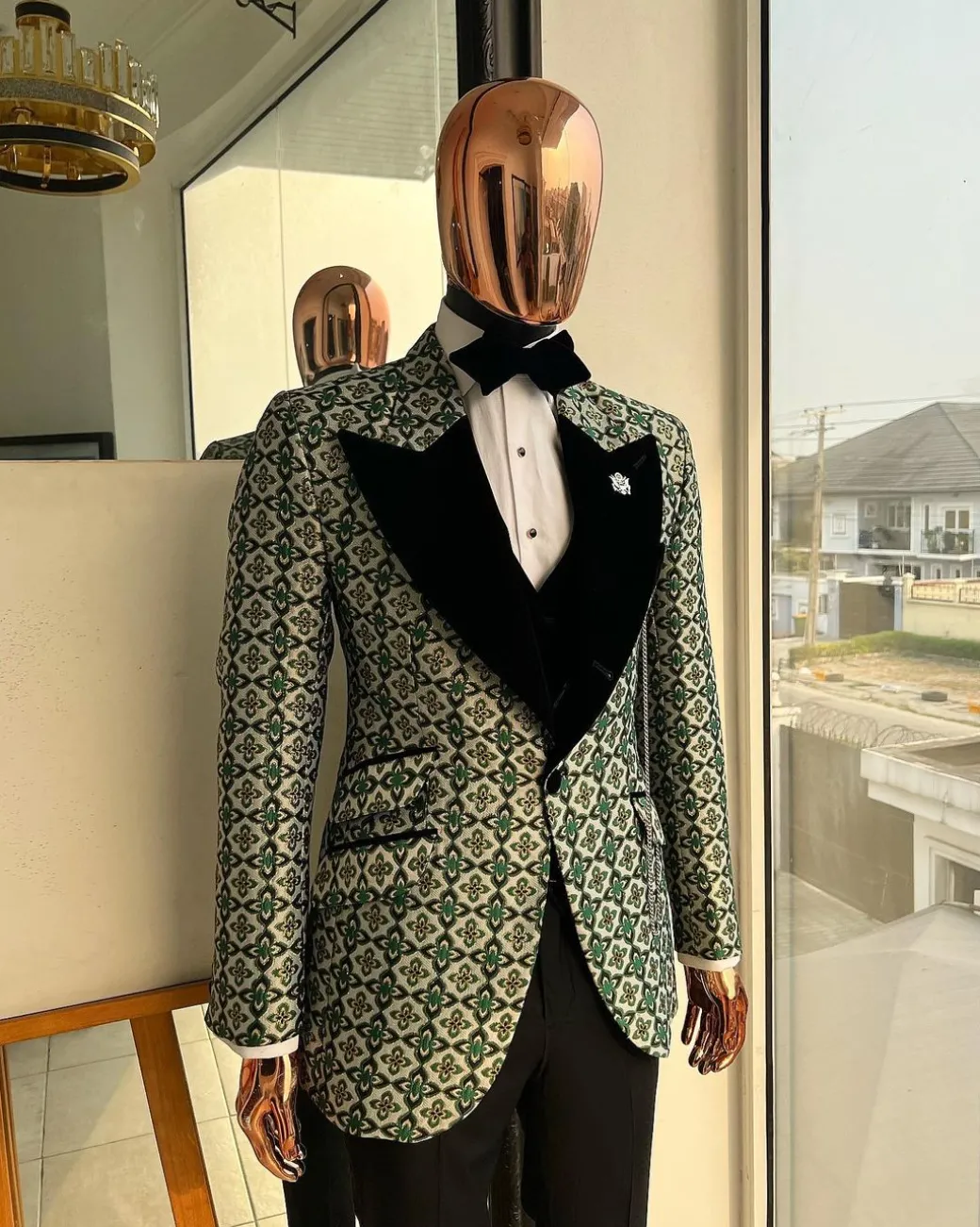 A Pine, pistachio green and black mix metallic jacquard, peak lapel tuxedo suit