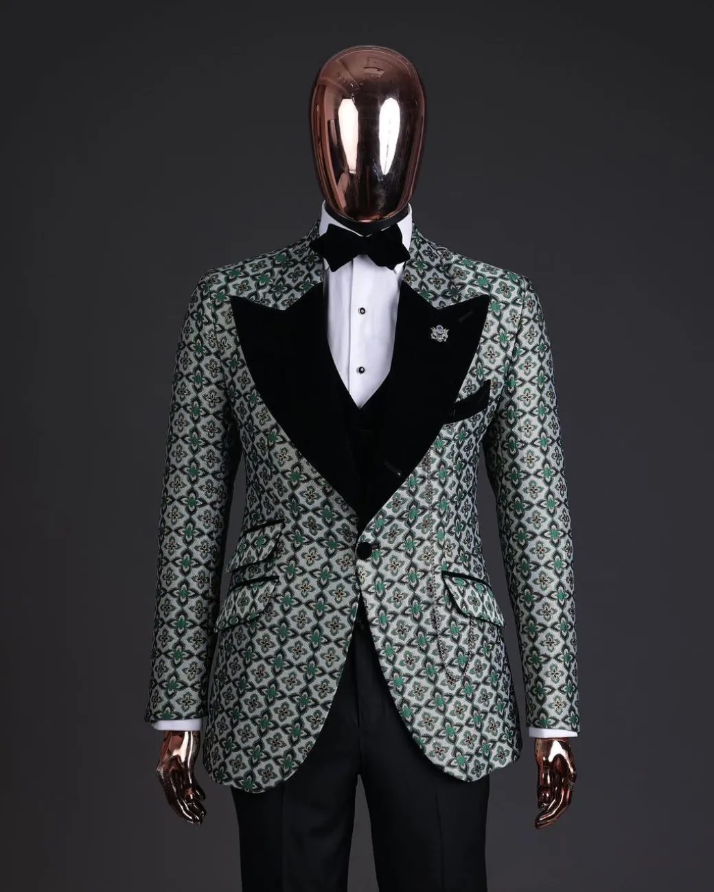A Pine, pistachio green and black mix metallic jacquard, peak lapel tuxedo suit