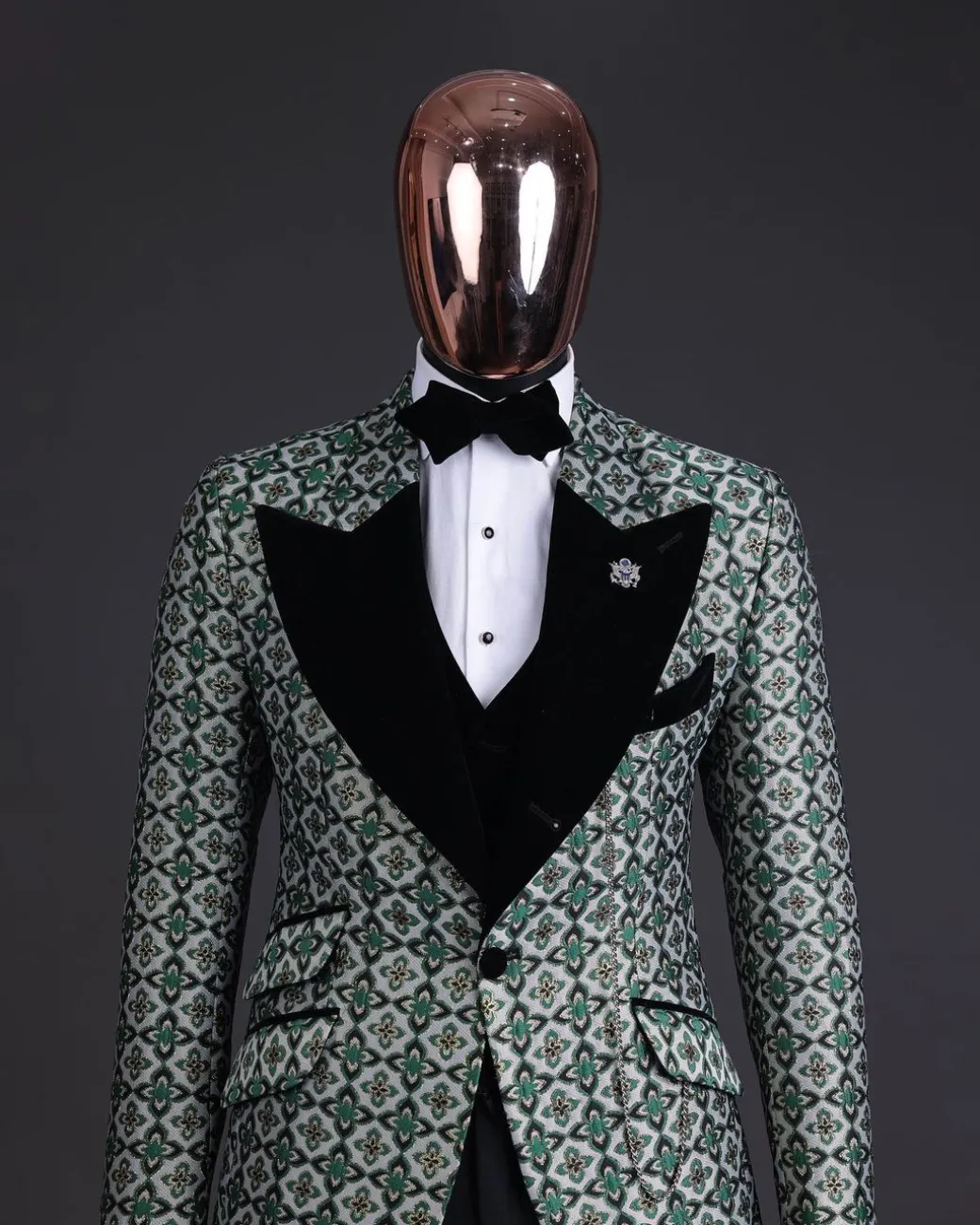 A Pine, pistachio green and black mix metallic jacquard, peak lapel tuxedo suit