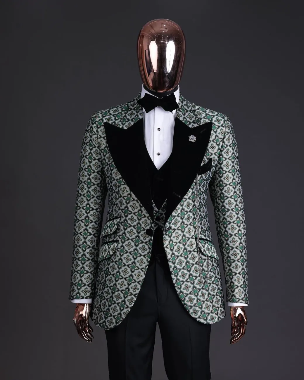 A Pine, pistachio green and black mix metallic jacquard, peak lapel tuxedo suit